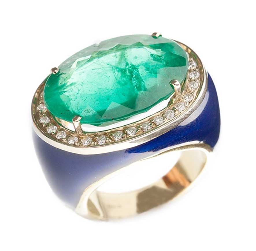 Anello ebano con pietra contornata di Diamanti
